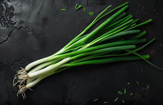 Які вітаміни в зеленій цибулі